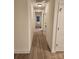 Light-filled hallway with wood-look flooring and neutral walls at 301 Cornelius Dr, Rock Hill, SC 29730