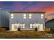 Two-unit home with backyard and deck at sunset at 3118 Amay James Ave, Charlotte, NC 28208