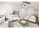 Spacious living room with a neutral color scheme and ceiling fan at 3118 Amay James Ave, Charlotte, NC 28208