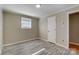 Simple bedroom with wood-look floors at 3524 Lancaster Hwy, Monroe, NC 28112