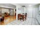 Kitchen with dining area, white cabinets, and stainless steel appliances at 3524 Lancaster Hwy, Monroe, NC 28112