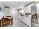 Bright kitchen featuring white cabinets and stainless steel appliances at 3524 Lancaster Hwy, Monroe, NC 28112