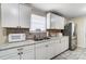 Modern kitchen with white cabinets and stainless steel appliances at 3524 Lancaster Hwy, Monroe, NC 28112