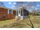 Screened porch with wooden steps and lattice at 3524 Lancaster Hwy, Monroe, NC 28112