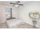 Bedroom with ceiling fan and window with curtains at 410 E Louisiana Ave # 2, Bessemer City, NC 28016