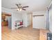 Living area with hardwood floors, a bench, and view into the kitchen at 410 E Louisiana Ave # 2, Bessemer City, NC 28016