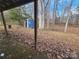 View of a shed and wooded area from under a porch at 4766 Dolph Monroe Rd, Maiden, NC 28650