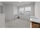 bedroom with carpet, a toy kitchen, a window, and neutral-toned paint and trim at 620 Altamonte Dr, Clover, SC 29710