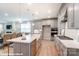 Modern kitchen with gray cabinets, white quartz countertops, and a gas cooktop at 9931 Cask Way, Huntersville, NC 28078