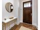 Close-up view of the entry way to the home with a view of the wood flooring at 1012 Rockway Dr, Charlotte, NC 28205