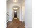 Inviting foyer with wood flooring and an arched doorway at 1012 Rockway Dr, Charlotte, NC 28205