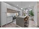 Modern kitchen with island and stainless steel appliances at 1220 Minter Pl, Charlotte, NC 28203