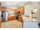 Spacious kitchen with stainless steel appliances and light wood cabinets at 794 Ledgestone Ct, Tega Cay, SC 29708