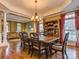 Bright dining room features hardwood floors and a large wooden table at 1362 Shinnecock Ln, Indian Land, SC 29707