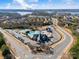 Aerial view showcases community amenities, including a pool, sports courts, and clubhouse at 17611 Austins Creek Dr, Charlotte, NC 28278