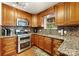 Kitchen with granite countertops and stainless steel appliances at 1870 Lillywood Ln, Fort Mill, SC 29707