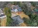 Aerial view showing home, detached garage, and large backyard at 2300 Hopedale Ave, Charlotte, NC 28207