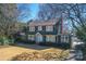 Two-story home with gabled roof and front yard at 2300 Hopedale Ave, Charlotte, NC 28207