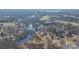 Aerial view of lakefront property with several houses and open green spaces at 2379 Justin Dr, York, SC 29745