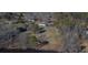Aerial view of a single-Gathering home on a wooded lot near a lake at 2379 Justin Dr, York, SC 29745