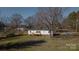 Aerial view of a manufactured home with a deck and yard at 2379 Justin Dr, York, SC 29745