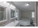 Modern bathroom with a large soaking tub and double vanity at 2379 Justin Dr, York, SC 29745