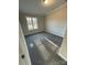 Bright bedroom with grey carpet and natural light at 2379 Justin Dr, York, SC 29745