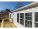 Home features a deck and siding, with large windows at 2379 Justin Dr, York, SC 29745