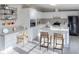 Modern kitchen with white cabinets, stainless steel appliances, and an island at 2379 Justin Dr, York, SC 29745