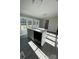 Modern kitchen island with black dishwasher and white countertop at 2379 Justin Dr, York, SC 29745