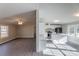 Open concept kitchen and living room with white cabinets and island at 2379 Justin Dr, York, SC 29745