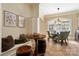 Charming breakfast nook features built-in bench seating, natural light and unique barrel table detail at 3042 Kings Manor Dr, Weddington, NC 28104