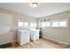 The laundry room features modern appliances, natural light, and ample space at 364 Scotts Creek Rd, Statesville, NC 28625