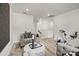 Cozy loft area with comfortable seating, soft carpeting, and ample natural light at 5215 Hatcher Creek Rd # 40, Charlotte, NC 28215