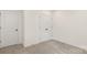 Bedroom with double door closet and neutral decor at 5240 Carden Dr, Charlotte, NC 28227