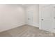Simple bedroom with closet and neutral wall color at 5240 Carden Dr, Charlotte, NC 28227
