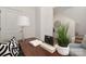 Modern desk with lamp and book adds style to this area at 5240 Carden Dr, Charlotte, NC 28227