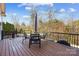 Spacious deck with table and chairs, offering scenic wooded views at 7252 Shenandoah Dr, Fort Mill, SC 29707