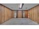 Unfinished basement with closets and wood paneling at 1056 Jolly Cemetery Rd, Taylorsville, NC 28681