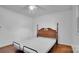 Simple bedroom with hardwood floors and a double bed at 1056 Jolly Cemetery Rd, Taylorsville, NC 28681