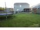 Large backyard with a hot tub, shed, and trampoline at 11677 Striker Ln, Midland, NC 28107