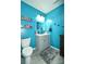 Bright bathroom with a modern vanity, floating shelves, and stylish decor at 11677 Striker Ln, Midland, NC 28107