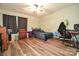 Bedroom with hardwood floors, ceiling fan and plenty of room for a desk and bed at 11677 Striker Ln, Midland, NC 28107