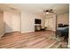 Spacious bonus room with hardwood floors, a ceiling fan, and plenty of space for relaxation or entertainment at 11677 Striker Ln, Midland, NC 28107