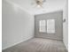 Bedroom with ceiling fan and neutral carpeting at 2049 Stoney Point Cir, Monroe, NC 28112