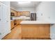 Kitchen features wood cabinets and stainless steel appliances at 2049 Stoney Point Cir, Monroe, NC 28112