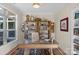 Home office with built-in shelves and large windows at 2205 Lincolnshire Ln, Waxhaw, NC 28173