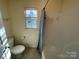 Clean bathroom featuring a shower/tub combo and toilet at 2306 Cota Ct, Charlotte, NC 28262