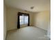 Simple bedroom with window and neutral decor at 2306 Cota Ct, Charlotte, NC 28262