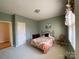 Cozy bedroom with window, carpet, and neutral walls at 2306 Cota Ct, Charlotte, NC 28262